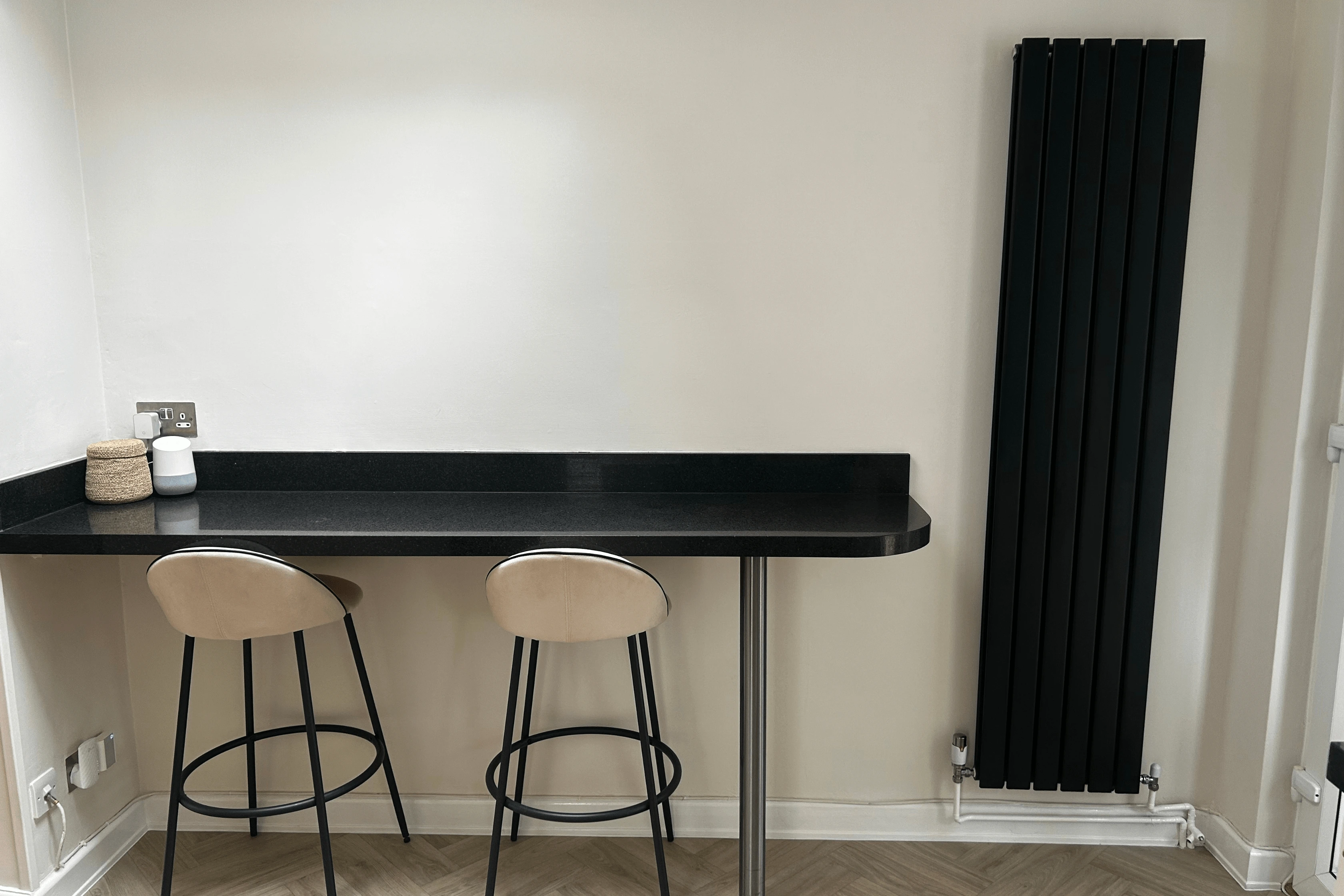 Matt Black Flat Panel Radiator In Home Space